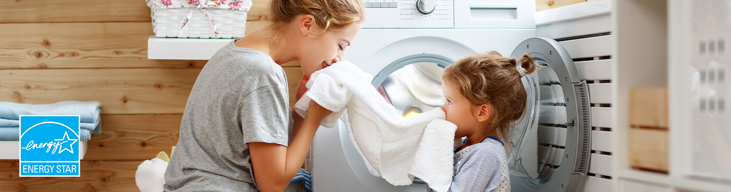 Two kids doing laundry